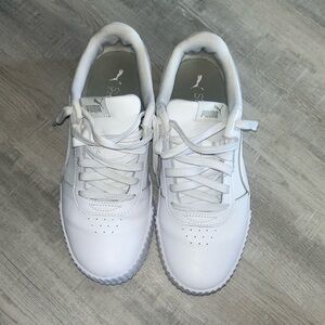 All white PUMA’s in size 10.